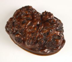 A Scottish root wood table snuff box, 19th century, the gnarled hollowed root with smooth oval cover