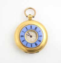 A yellow metal ladies half hunter pocket watch, the circular white dial with Roman numerals and