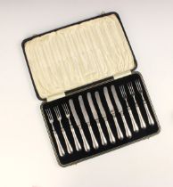 A cased set of George V silver handled pickle forks and knives, Barker Brothers, Sheffield 1930,