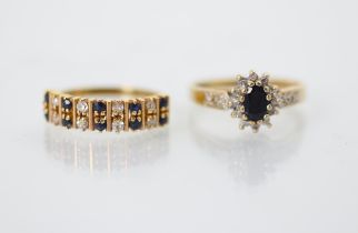 A diamond and untested sapphire double row ring, the eight round cut diamonds interspersed with