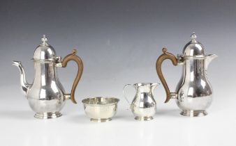 A George V silver four piece bachelors coffee service, Goldsmiths and silversmiths, London 1935,