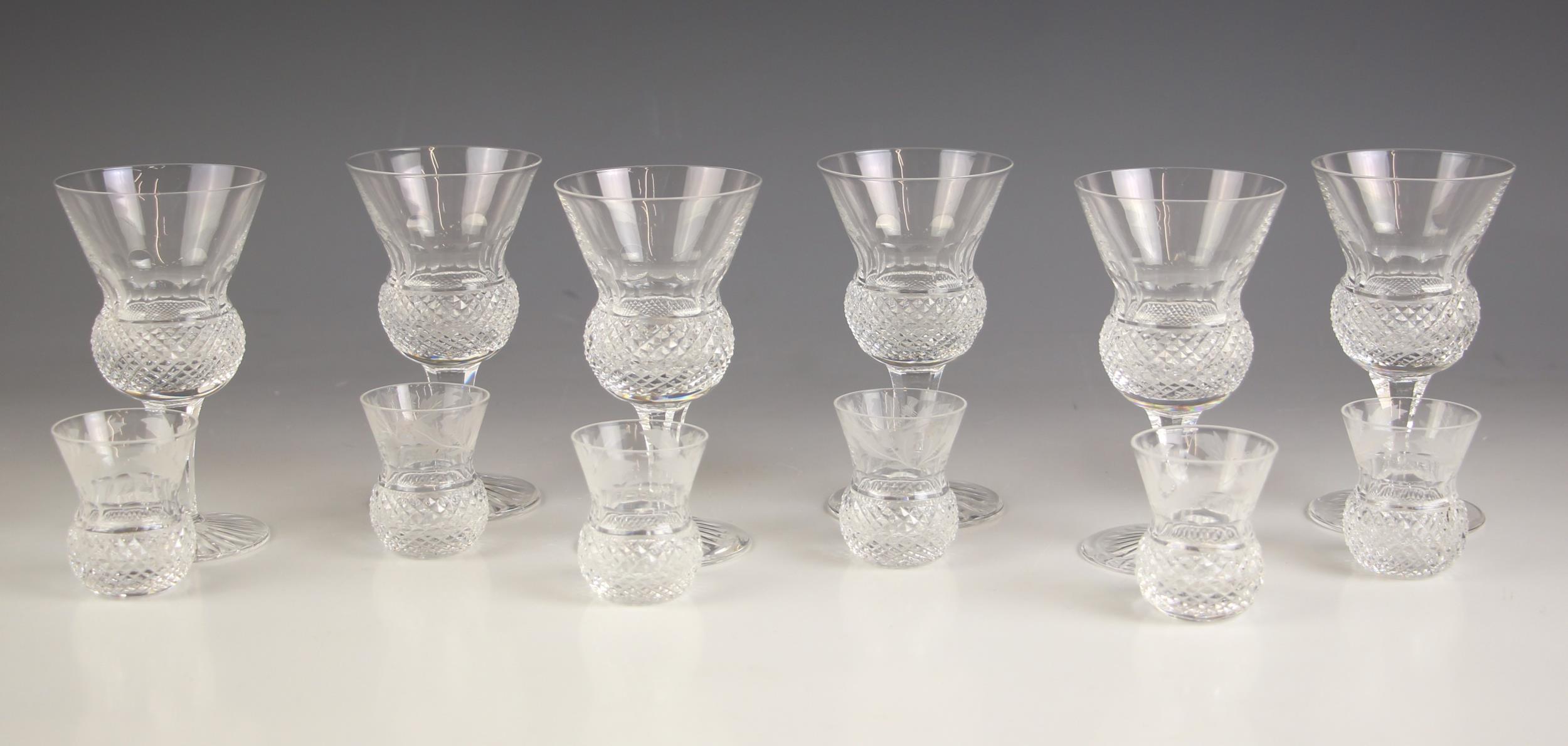 Six Edinburgh Crystal thistle pattern whiskey tots, each modelled as a thistle seed head with
