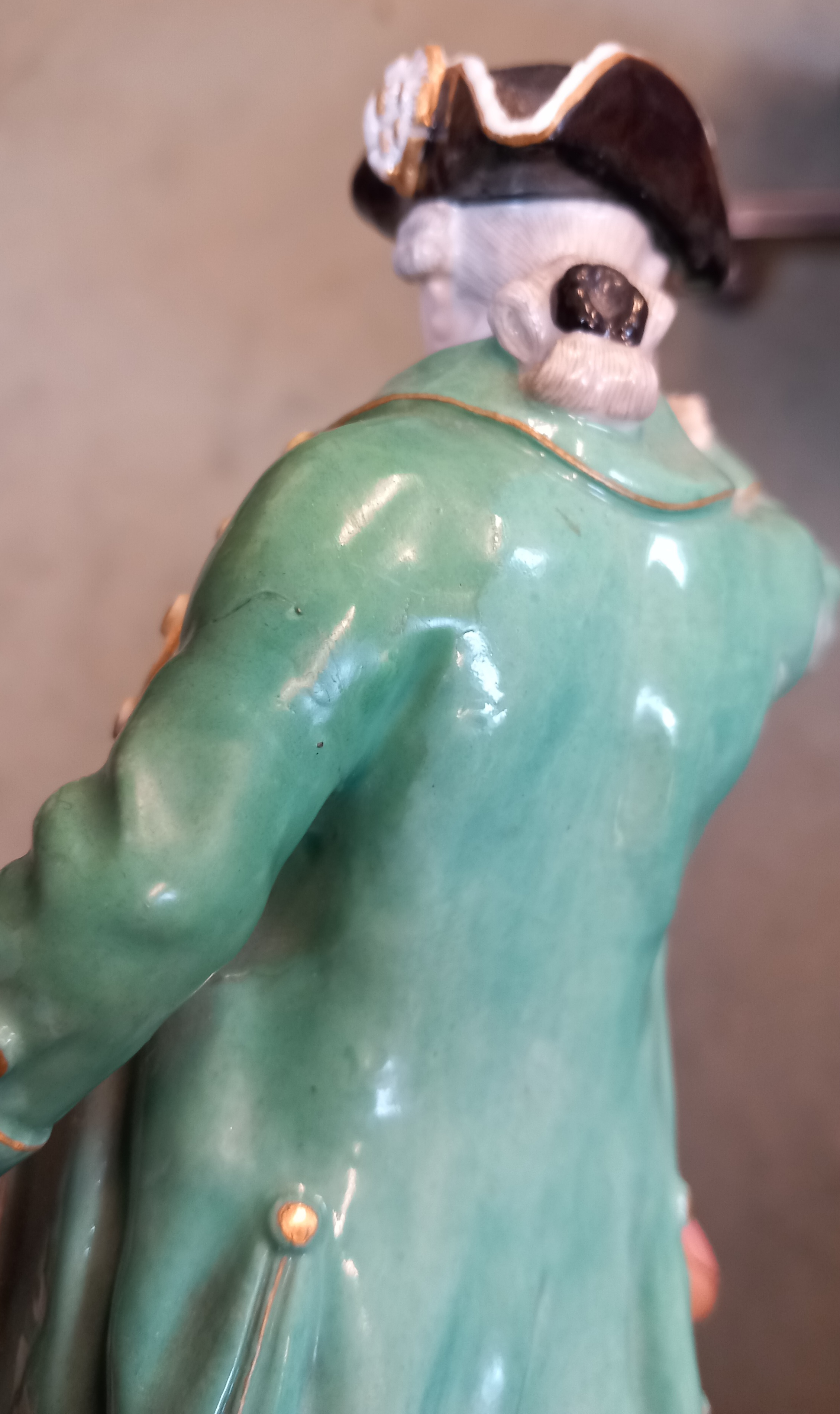 A Meissen figure, 19th century, of a gentleman with tri-corn hat, turquoise overcoat and breeches - Image 7 of 10