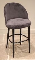 A Heals 'Austen' plush velvet bar stool, the curved back rest and upholstered seat upon ebonised