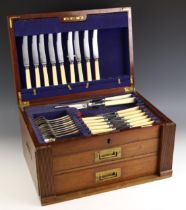 A canteen of Old English pattern silver flatware, including tablespoons, teaspoons, table forks,