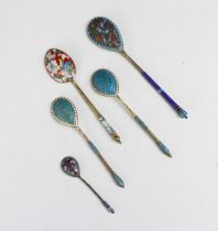 A group of five silver gilt and enamel Russian spoons, including a Moscow example, with 84 kokoshnik