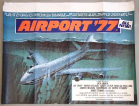 A UK quad cinema poster for AIRPORT '77 (1977) starring Jack Lemmon and Olivia de Havilland,