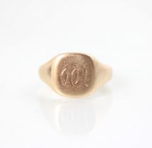 A 9ct rose gold signet ring, the square head leading onto plain polished shank, stamped 'M&M'