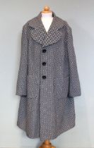 A black and white spotted wool single breasted ladies coat, with ‘Ameliemay’ label to interior, UK