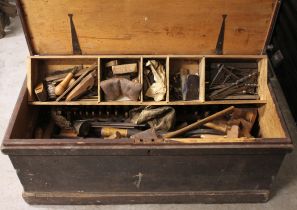 A Victorian pine joiners tool chest, the hinged cover opening to a removable tray and a collection