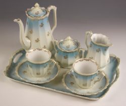 A continental porcelain duet set, 20th century, comprising: two coffee cups and saucers, each 6cm