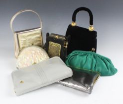 A vintage black velvet evening bag, with velvet rope handle and gilt terminals, with six other