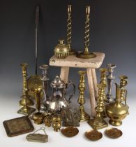 A selection of brass candlesticks, 19th century and later, to include a pair of ejector candlesticks