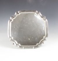 A George V silver salver, Lee and Wigfull, Sheffield 1929, of octagonal shaped form, with stepped