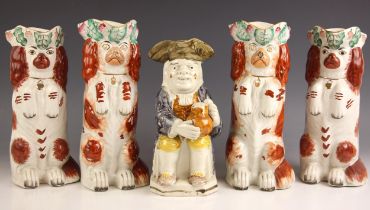 A pair of Staffordshire King Charles ceramic 'begging dog' spaniel Toby jugs, 20th century,
