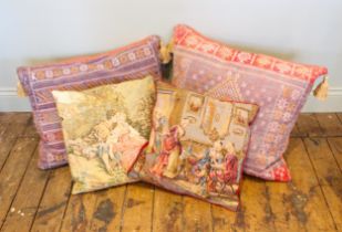 Two Moroccan floor cushions of large proportions, each of typical design with geometric patterns