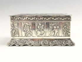 A continental white metal box, possibly French, the removable rectangular lid with embossed