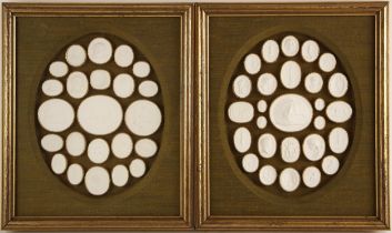 Two Grand Tour style framed and glazed classical plaster intaglio displays, probably early 20th