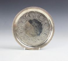 A George III silver waiter, Robert Gray and Son, Edinburgh 1817, the gadrooned rim above florally