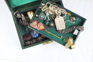A selection of costume jewellery, including base metal and enamel clips, filigree patterned bracelet