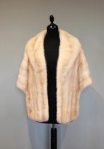 A mid 20th century blond milk shoulder wrap, labelled 'Ellis Barker Chester' with a 1960s silver fox