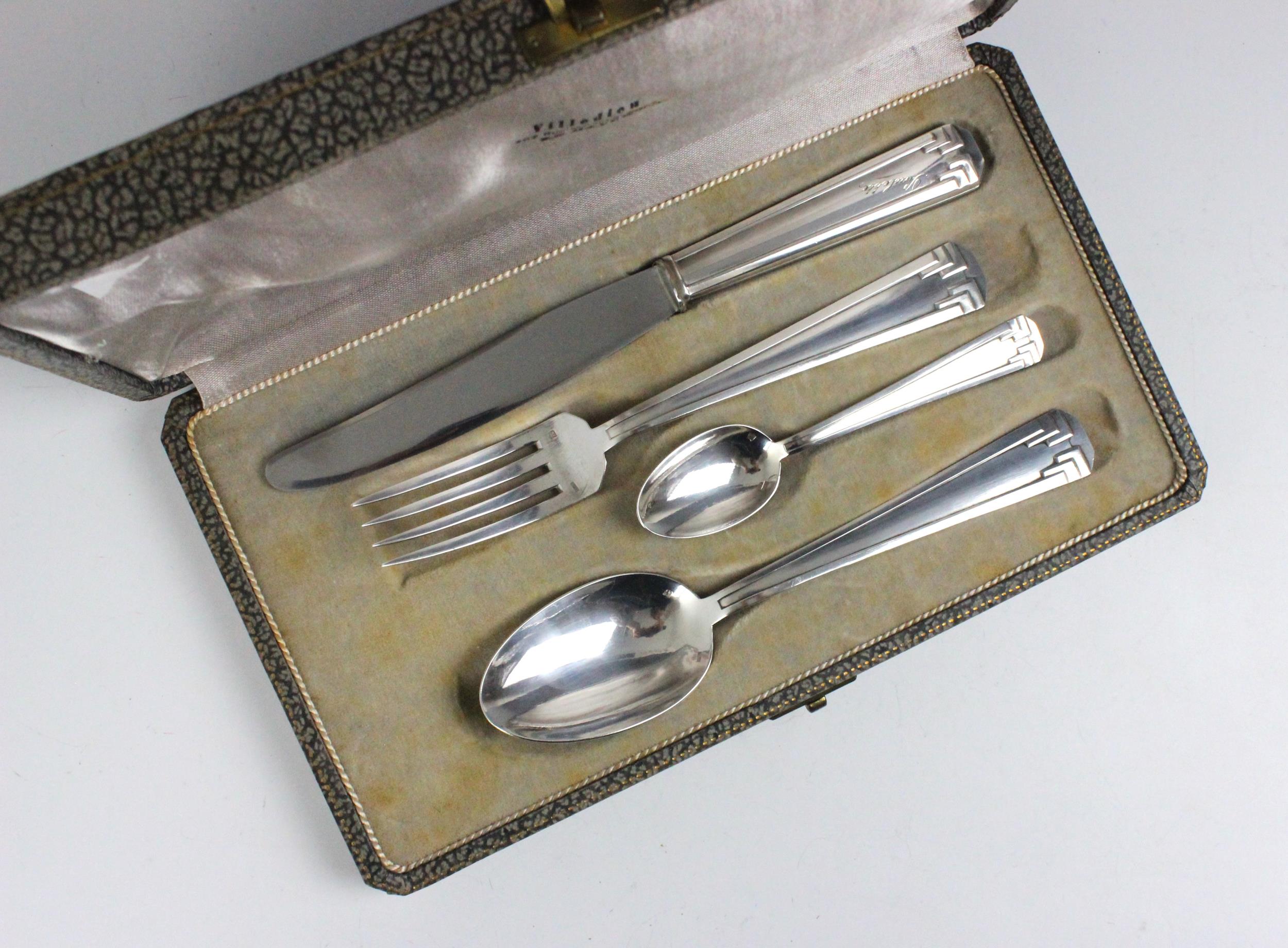 A cased set of Ravinet Denfert silver plated flatware, comprising table knife, fork, spoon and