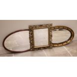 A giltwood Florentine wall mirror, late 19th century, the scrolling open work foliate frame