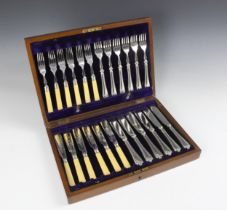 A canteen of silver plated flatware, the six place fish service with knife blades engraved with