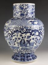 A large Chinese porcelain blue and white baluster vase, 19th century, the baluster shaped temple jar