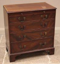 A mahogany and rosewood cross banded bachelors chest, 19th century, the moulded top over a