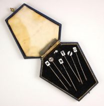 A cased set of George V silver and enamel cocktail sticks, S Blanckensee & Son Ltd, Birmingham 1935,
