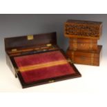 A mid 19th century rosewood and brass inlaid writing slope, opening to a velour writing surface