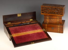 A mid 19th century rosewood and brass inlaid writing slope, opening to a velour writing surface