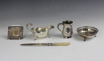 A selection of five silver items, including a George V silver bonbon dish, Goldsmiths and