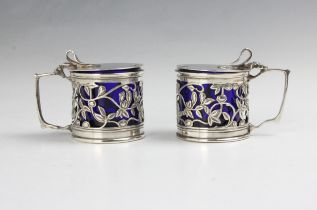 A pair of Edwardian silver wet mustards, William Hutton & Sons Ltd, Birmingham 1903, of