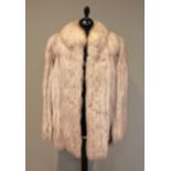 A late 20th century/ early 21st century, hip length silver fox jacket, labelled 'Saga Fox', clip