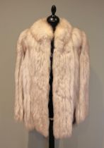 A late 20th century/ early 21st century, hip length silver fox jacket, labelled 'Saga Fox', clip