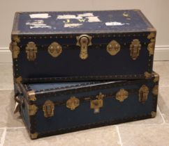 A blue canvas steamer/travel trunk, early 20th century, applied with metal corner brackets and