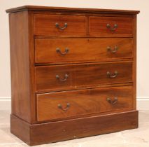 An Edwardian mahogany and satinwood cross banded chest of drawers, formed with two short over