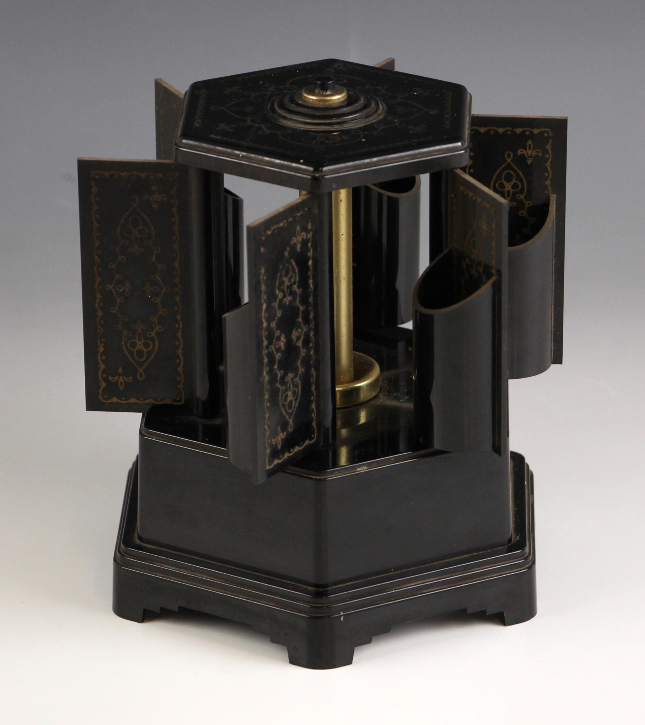 A Swiss novelty clockwork musical cigarette box by Reuge, 20th century, of hexagonal form on stepped - Image 3 of 3