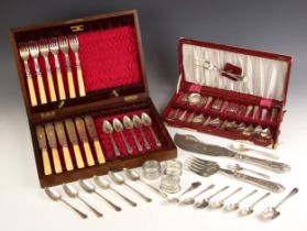 A six place silver plated fish service, the engraved blades and tines with bone handles within