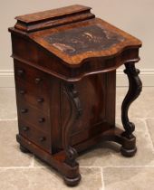 A Victorian burr walnut serpentine davenport, the hinged writing slope with inset leather skiver (