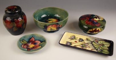 A selection of five pieces of Moorcroft pottery, 20th century and later, to include: a 'Pomegranate'