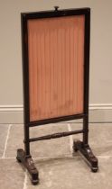 An early Victorian rosewood rise and fall screen, the pleated satin fabric screen within a plain