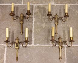 A set of four brass Adam style two branch wall light fittings, 20th century, each of urn and