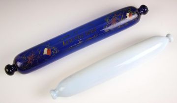 A 19th century Bristol Blue glass rolling pin, titled 'Love & Be True', surrounded by foliate