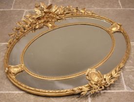 A 19th century giltwood and gesso oval wall mirror, surmounted with a pair of birds, quiver of