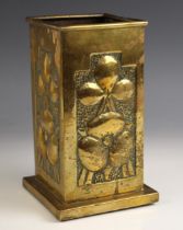 An Arts and Crafts brass spill vase, early 20th century, of square section with rolled rim and