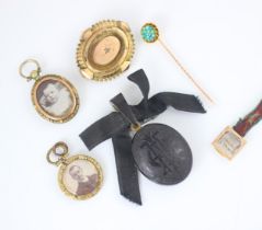 A selection of jewellery, including a gold plated Victorian style brooch, set with diamond to