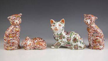 A pair of Japanese Kutani porcelain cats, 20th century, each modelled standing, 18cm high, with a
